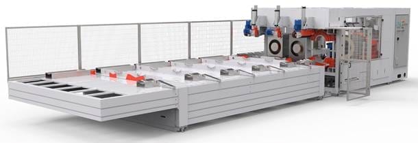 Large industrial packaging machine with conveyor system.