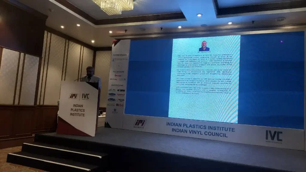 Speaker at Indian Plastics Institute event with presentation.