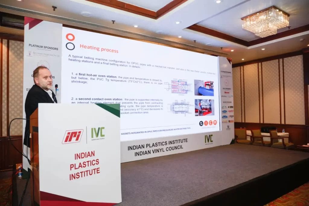 Speaker presents at Indian Plastics Institute conference.